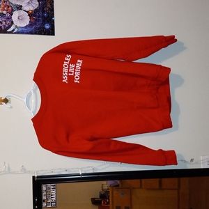 Men's red "assholes live forever" sweater